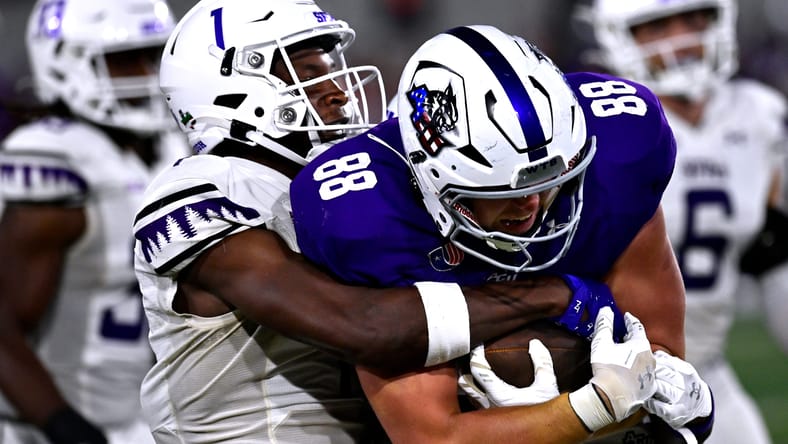 Charles Demmings attempts a tackle against Abilene Christian.