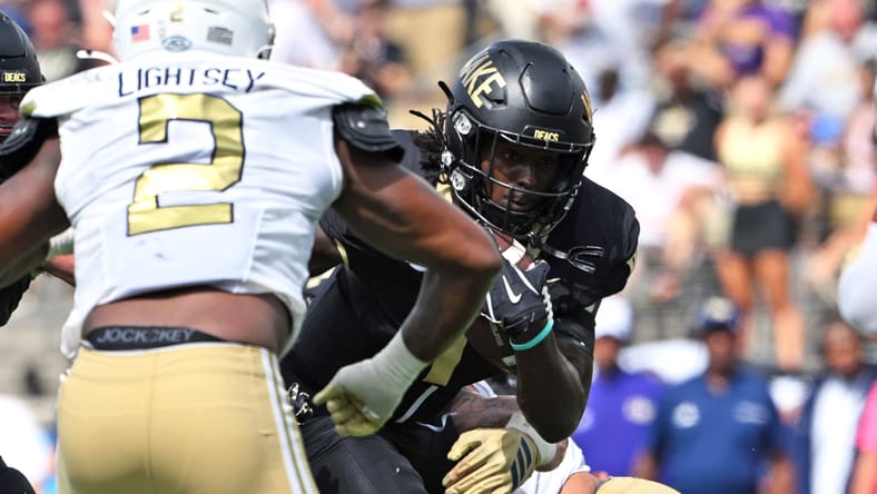 Demond Claiborne runs against Georgia Tech at Allegacy Stadium. Vikings draft