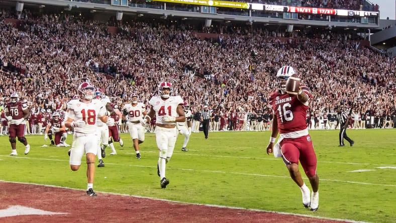 LaNorris Sellers scoring a rushing touchdown during a game against Alabama. LaNorris Sellers Vikings