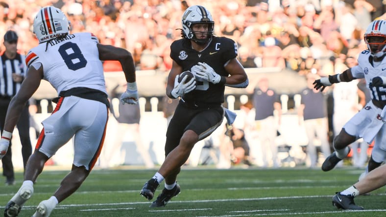 Eli Stowers runs with the ball against Auburn at FirstBank Stadium. Eli Stowers Vikings