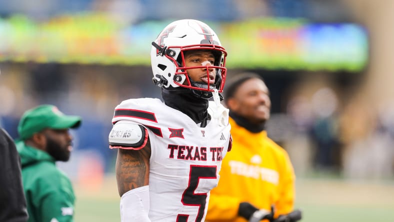 Caleb Douglas runs onto the field during a Texas Tech game against West Virginia. vikings mock draft 2026