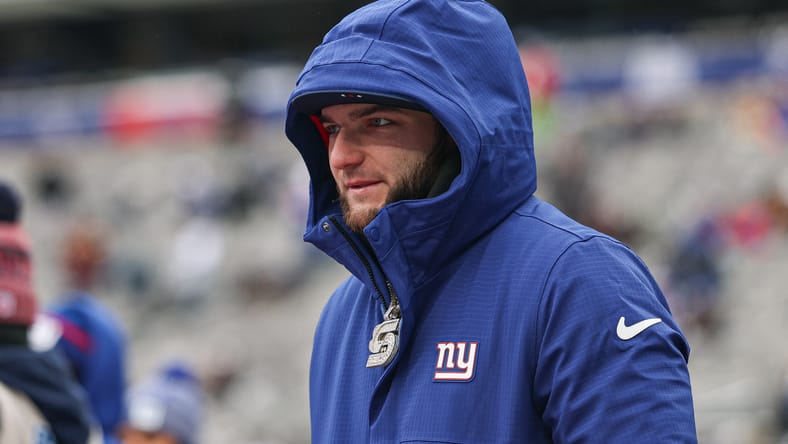 Cam Skattebo on the field before a Giants game at MetLife Stadium. Cris Carter Cam Skattebo