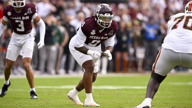 Cashius Howell lines up on defense for Texas A&M during a game. vikings draft curveballs 2026.