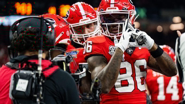 Dillon Bell celebrating a touchdown during a College Football Playoff game at the Sugar Bowl. Dillon Bell Vikings