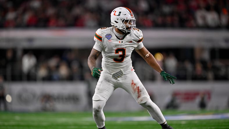 Akheem Mesidor lines up on the defensive line during the College Football Playoff Cotton Bowl at AT&T Stadium. Vikings draft big board 2026