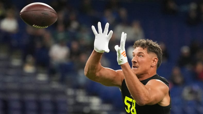 Mason Reiger participates in drills at the NFL Scouting Combine. Mason Reiger Vikings.