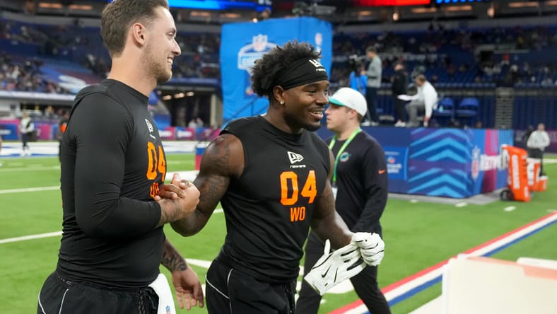 Carson Beck and Dillon Bell walking together during NFL Combine activities. Dillon Bell Vikings