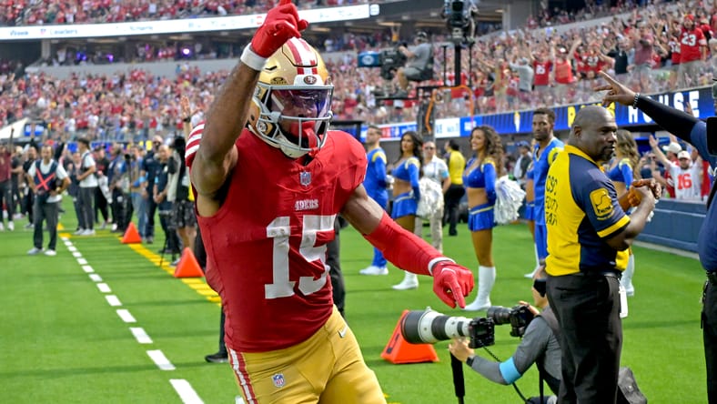 Jauan Jennings celebrates after scoring a touchdown against the Rams at SoFi Stadium. Jauan Jennings Vikings