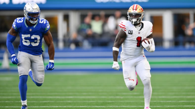 Deebo Samuel Sr. runs for a long touchdown against the Seahawks at Lumen Field. Deebo Samuel Vikings.