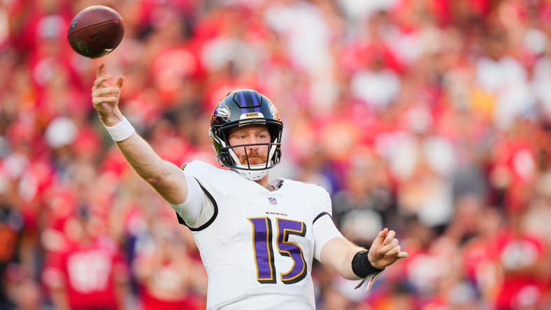 Cooper Rush throws a pass for the Ravens during a road game against the Chiefs at Arrowhead Stadium.
