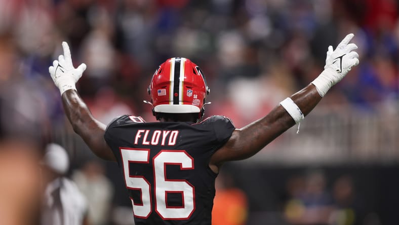 Leonard Floyd reacts after an interception during a Falcons game. vikings predictions.