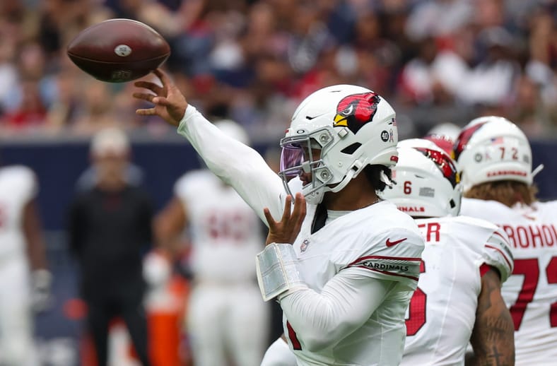Kyler Murray throwing a pass during a Cardinals game against the Texans. Chase Edmonds Kyler Murray.