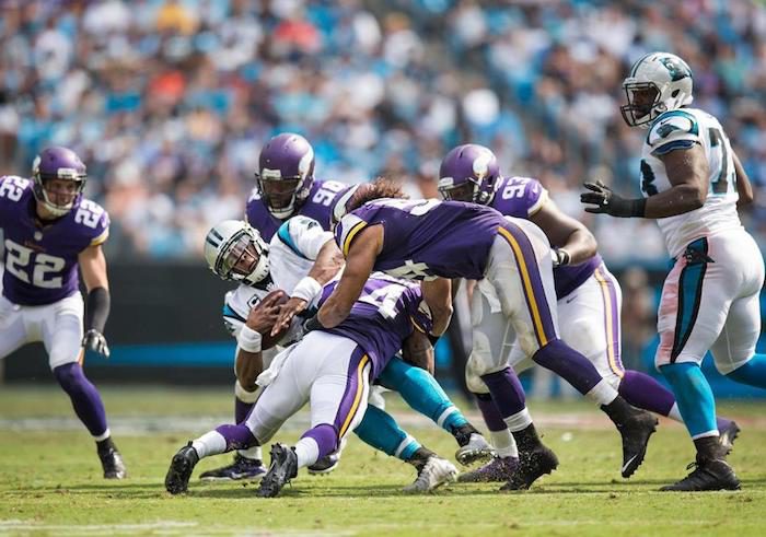 The Vikings defense smothered Panthers quarterback Cam Newton like he was a Juicy Luicy. (Vikings.com)