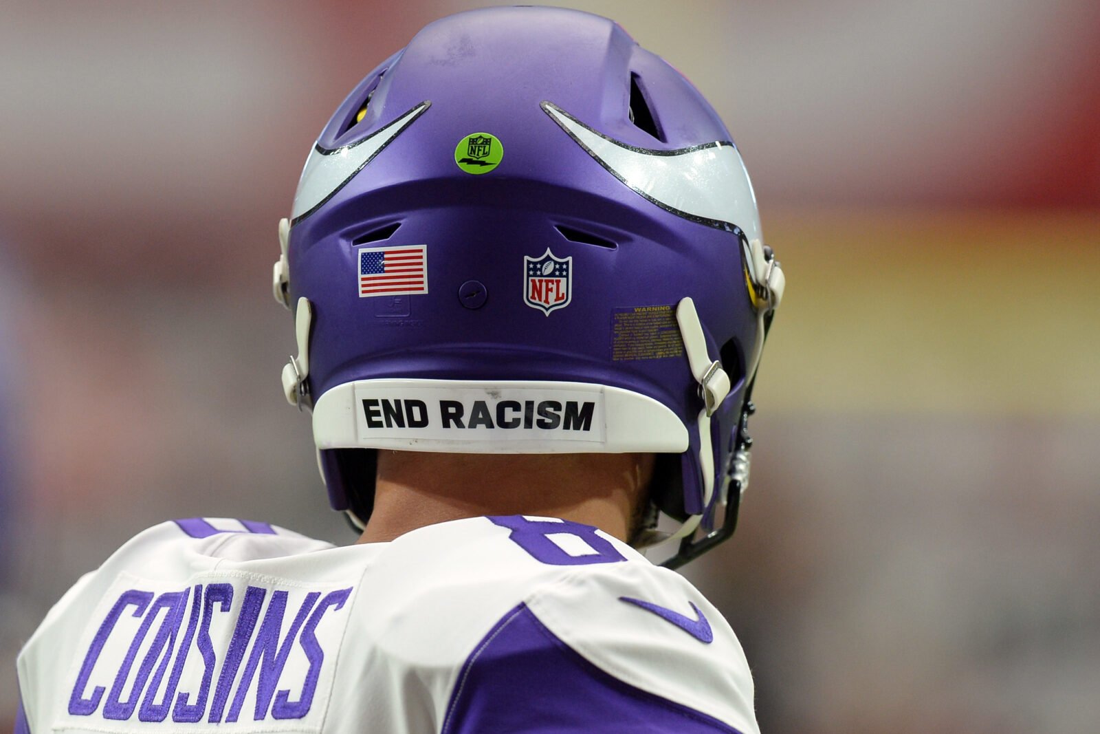 nfl helmet end racism