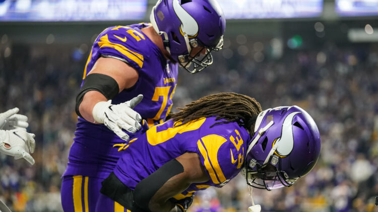 Minnesota Vikings running back Dalvin Cook (33) runs into the end zone for  a touchdown during