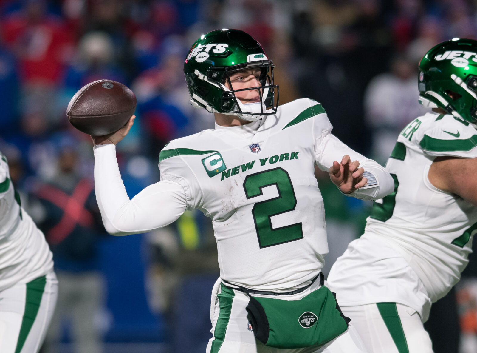 New York Jets quarterback Zach Wilson hands off to New York Jets