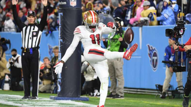 Brandon Aiyuk celebrating after a touchdown against the Titans