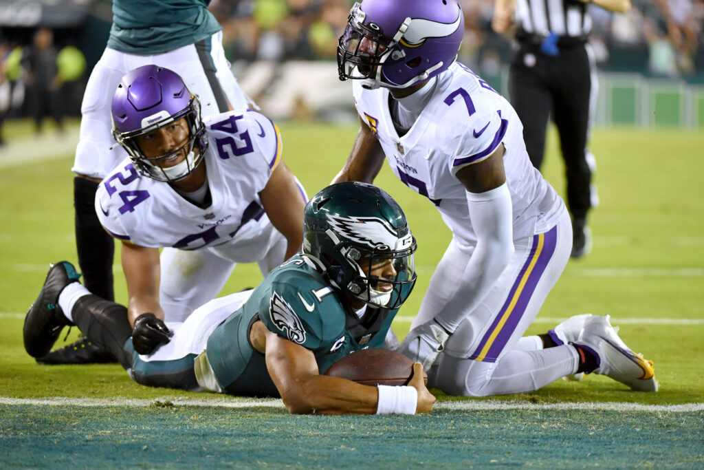 Minnesota Vikings safety Camryn Bynum (24) defends Miami Dolphins wide  receiver Tyreek Hill (10) during the