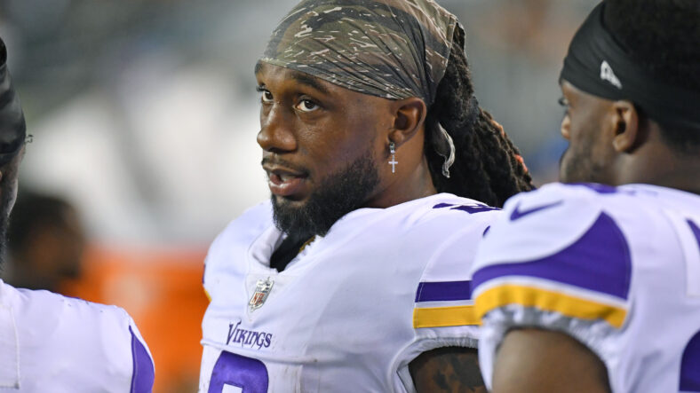 Minnesota Vikings running back Dalvin Cook walks on the field