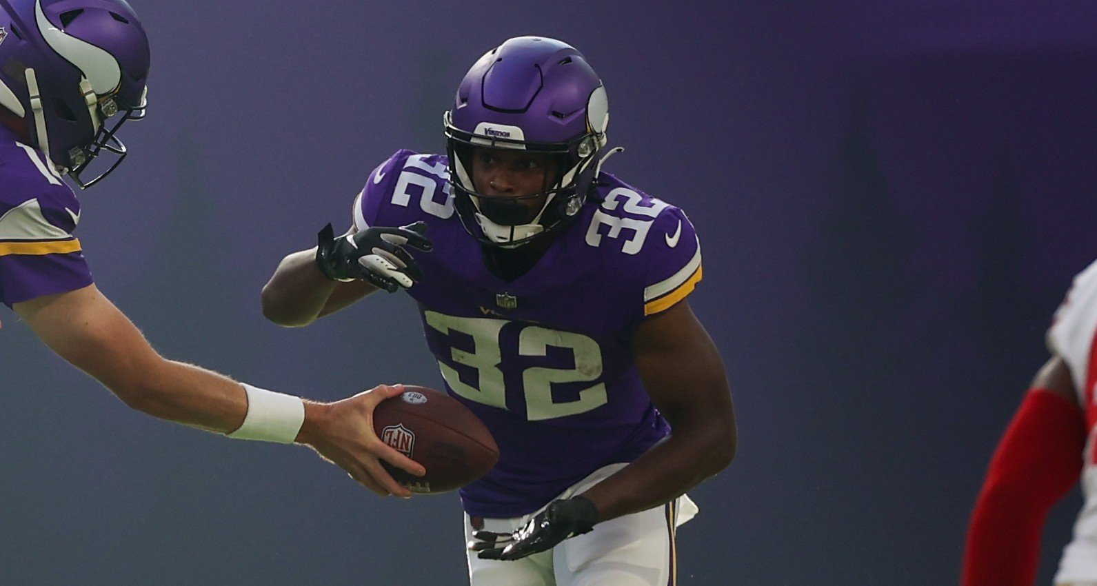 MIAMI GARDENS, FL - OCTOBER 16: Minnesota Vikings defensive tackle Ross  Blacklock (96) tries to get