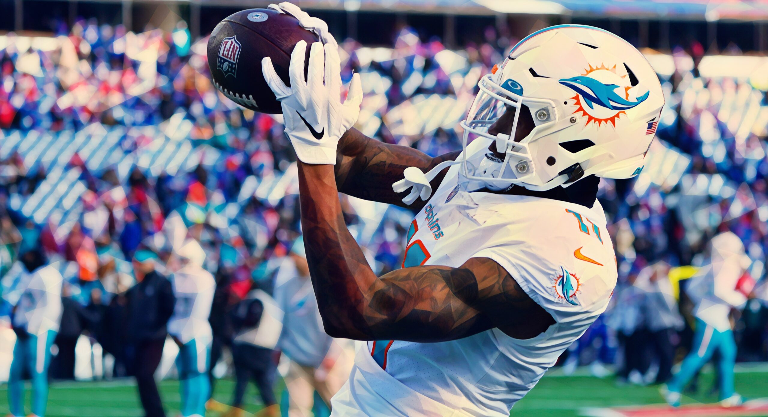 Miami Dolphins wide receiver Cedrick Wilson Jr. (11) runs during the second  half of an NFL