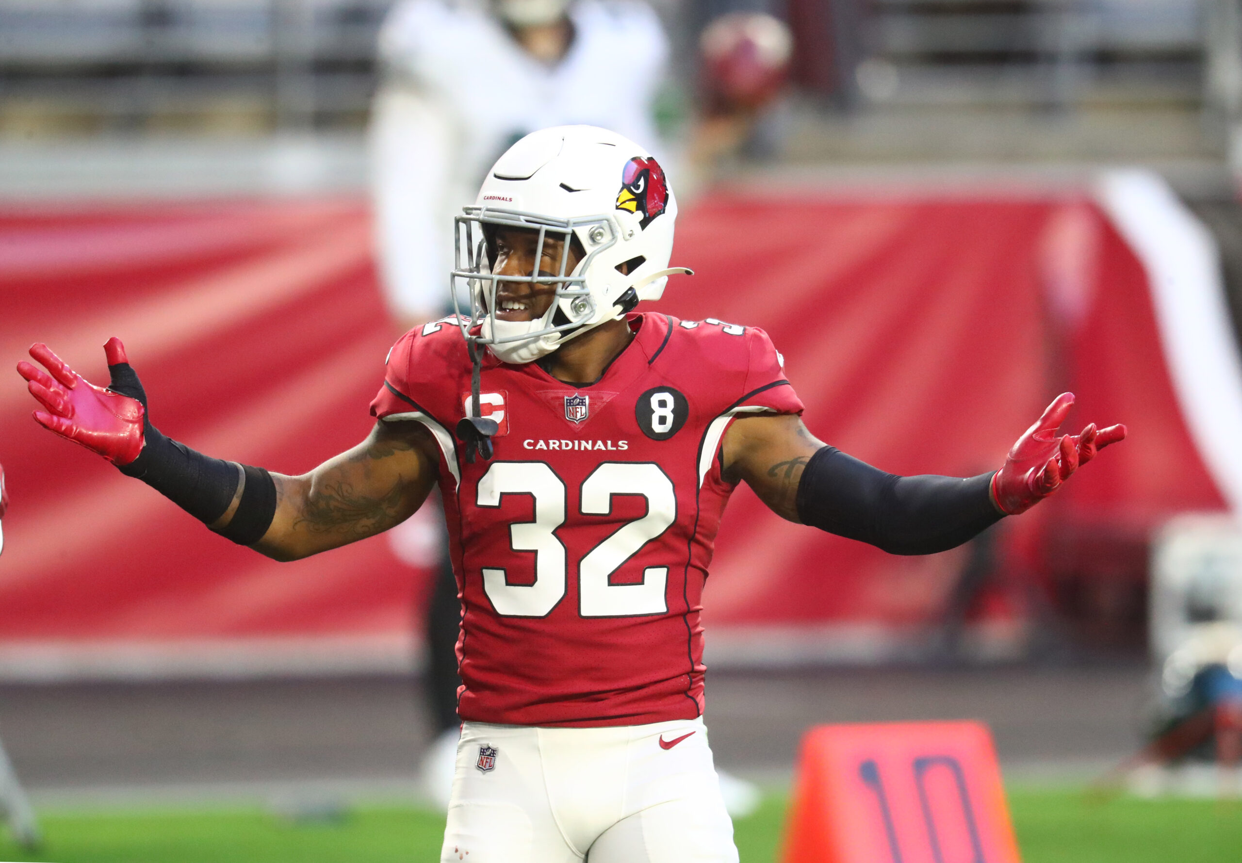 Arizona Cardinals safety Budda Baker (3) warms up before an NFL