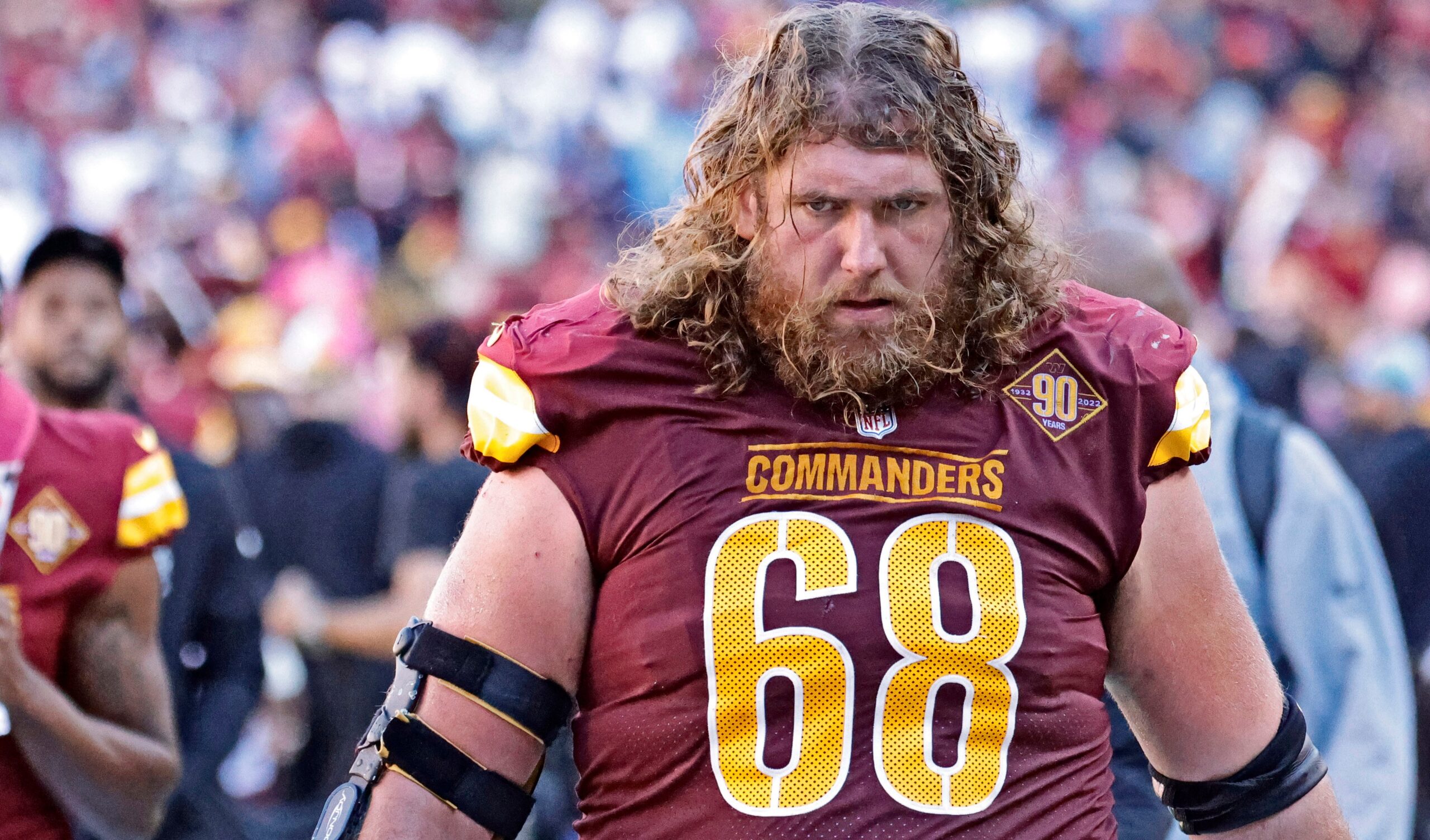 Washington Commanders center Tyler Larsen (69) blocks against the