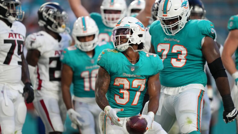 Miami Dolphins running back Myles Gaskin (37) takes part in drills