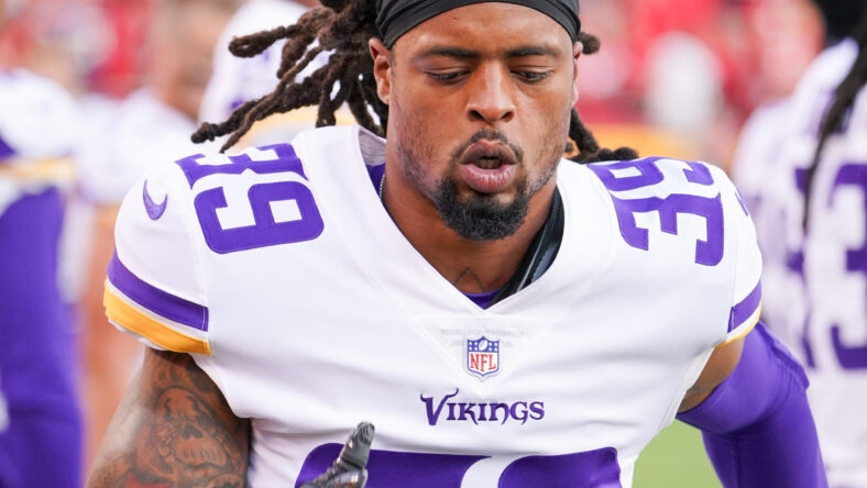 KANSAS CITY, MO - AUGUST 27: Minnesota Vikings free safety Harrison Smith  (22) is interviewed on the sidelines during an NFL preseason game between  the Minnesota Vikings and Kansas City Chiefs on