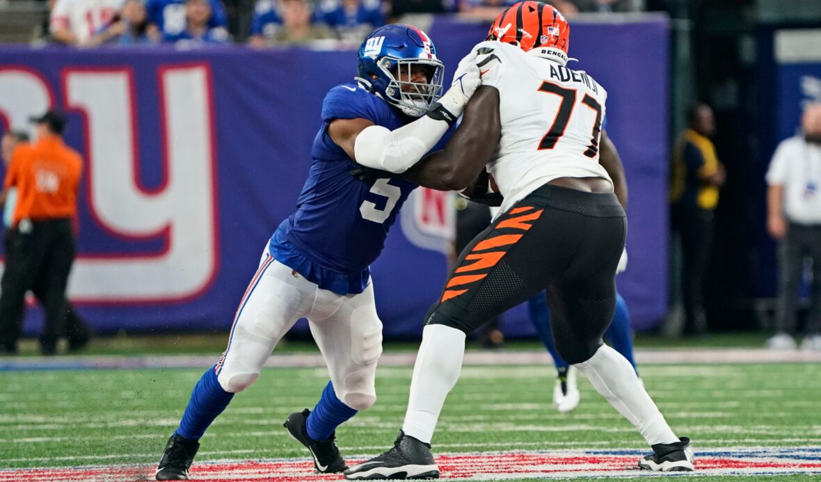 Cincinnati Bengals guard Hakeem Adeniji (77) runs onto the field