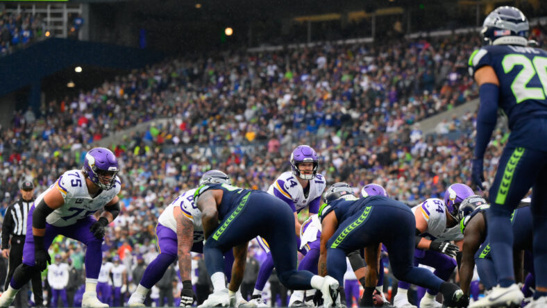 Sam Darnold leads the offense during first-half play in Seattle.