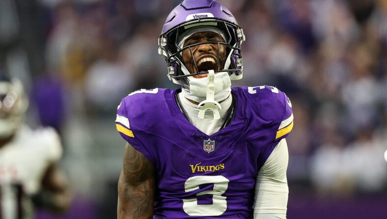 Jordan Addison celebrates fourth-quarter catch vs. Falcons at U.S. Bank Stadium.