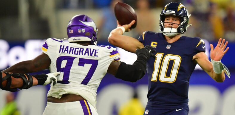 Javon Hargrave applies pressure on Justin Herbert during the Vikings’ road game at SoFi Stadium.