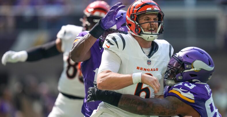 Minnesota Vikings DT Jonathan Allen gets a QB hit on CIN QB Jake Browning