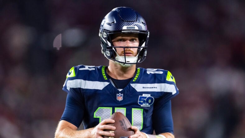 Sam Darnold prepares for a play against the Cardinals.