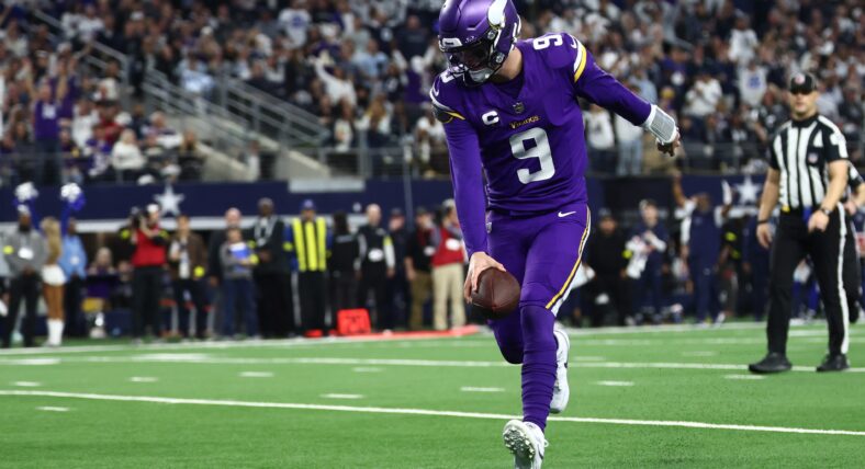 J.J. McCarthy runs for a first-half touchdown at AT&T Stadium.